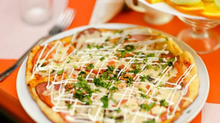 Pizza with Sausage, Tomatoes and Basil